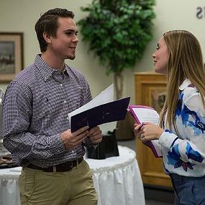Business students sharing ideas at HSU event